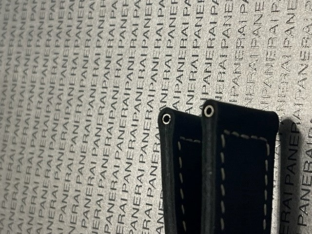 Panerai rubber strap close-up with black leather texture and stitching