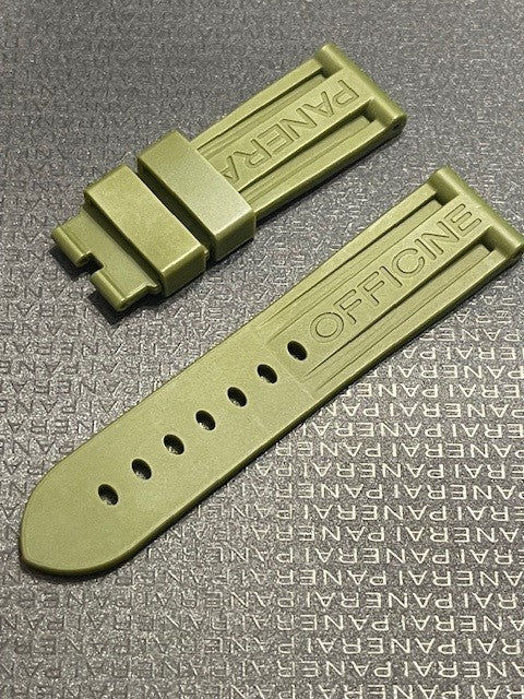Panerai rubber strap in olive green with 'OFFICINE' text, displayed on logo background