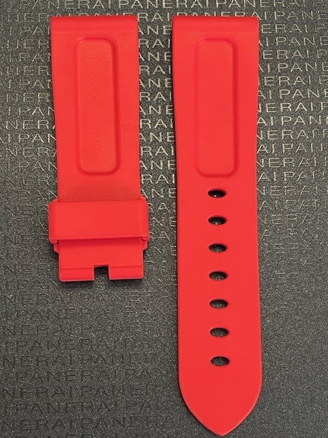 Two red watch bands featuring multiple holes for adjustable fitting.