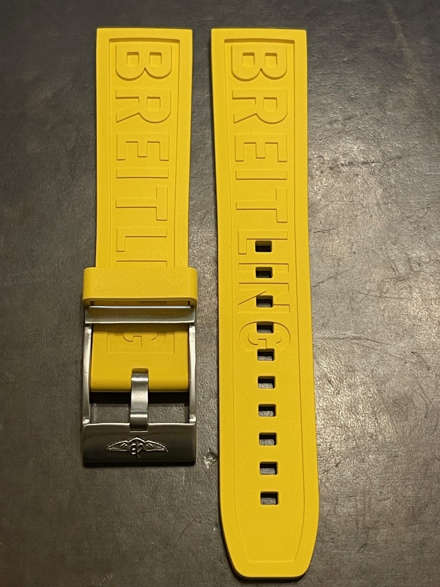 BREITLING yellow rubber watch strap with silver buckle and adjustment holes