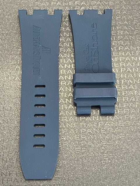 Two blue watch straps featuring multiple holes for adjustable fitting.