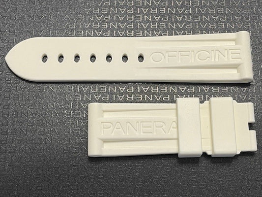 PANERAI watch strap in white rubber featuring embossed branding on dark textured surface